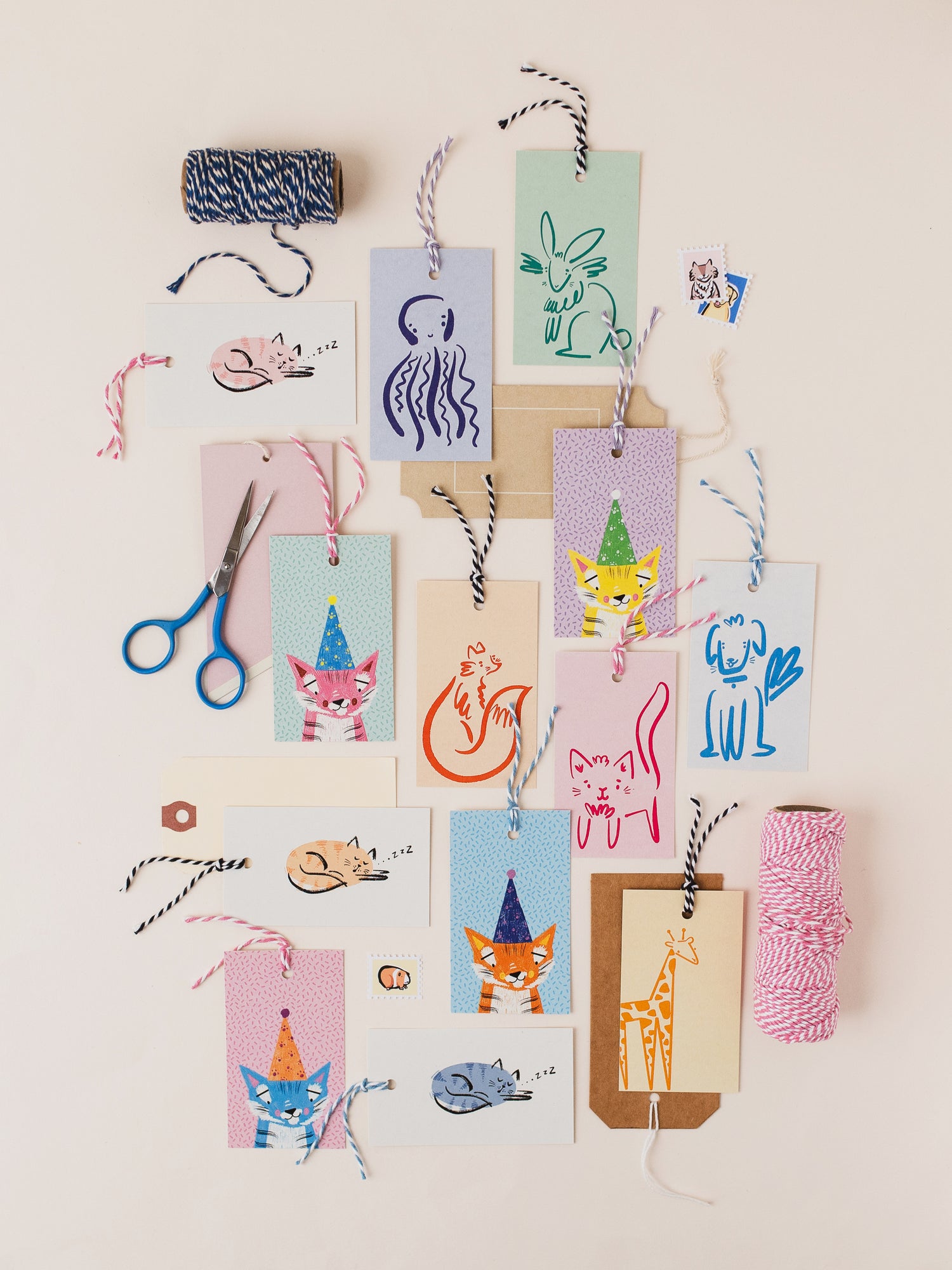 Colourful gift tags with animal illustrations on a light background